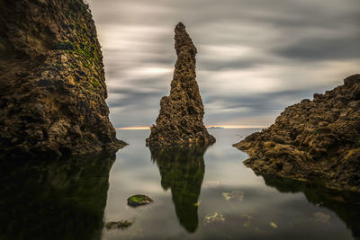 Close-up of rocks against sky