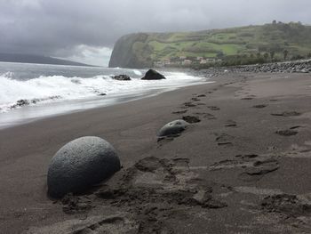 Scenic view of beach against sky
