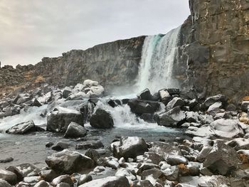 View of waterfall against sky