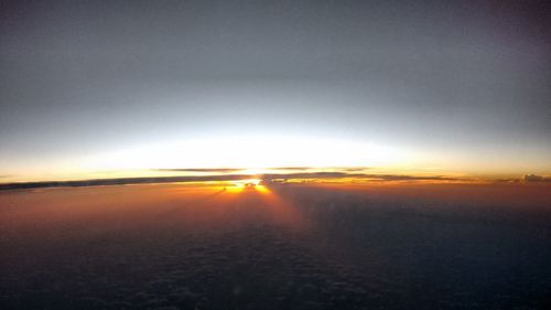 Scenic view of landscape at sunset