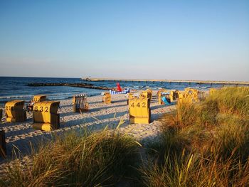 Scenic view of beach against clear sky