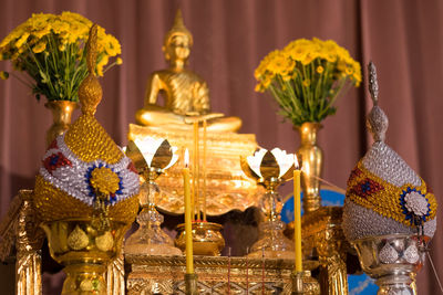 Close-up of illuminated statues