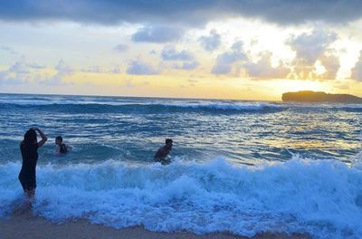 Tourists enjoying at beach