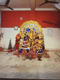 Statue in temple against building