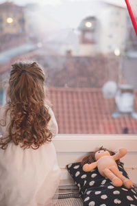 Cute girl with mask at home