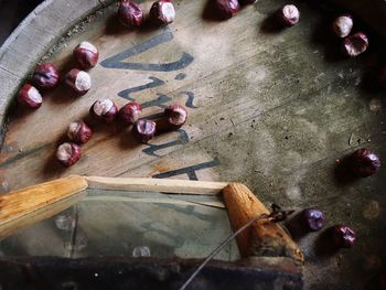 High angle view of chestnuts on wooden table