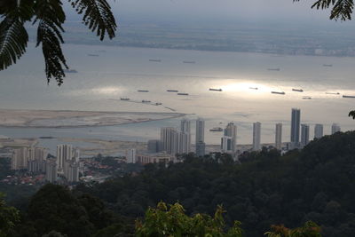 Scenic view of city buildings against sky