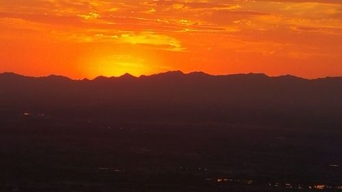 Scenic view of mountains at sunset