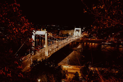 High angle view of bridge over river at night