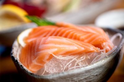 Close-up of orange fish in plate
