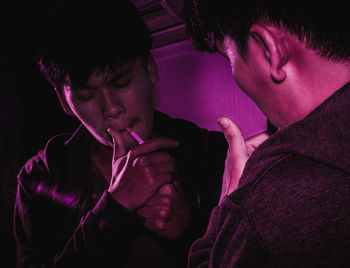 Full length of friends at home