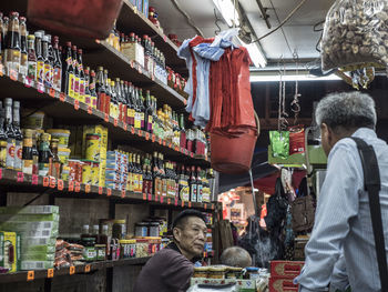 Men on display at market