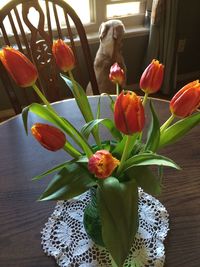 Close-up of tulips in vase on table