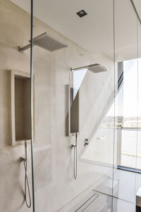 Modern shower cubicle in empty bathroom