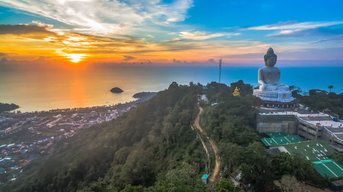 High angle view of city at sunset