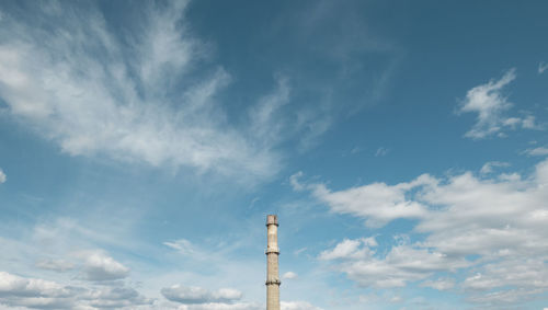 Smoke stack against sky