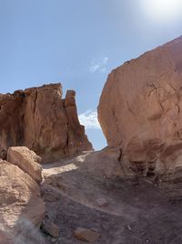 Rock formations in desert against sky