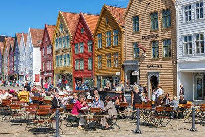 People sitting at sidewalk cafe