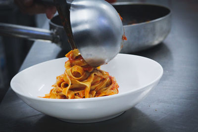 Close-up of noodles in bowl on table