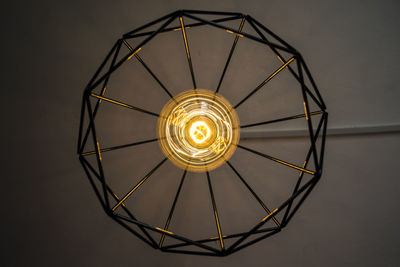 Low angle view of illuminated light bulb
