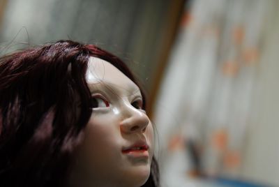 Close-up portrait of a girl looking away