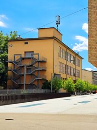 Buildings in city against sky