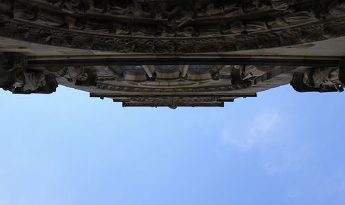 Low angle view of monument against blue sky