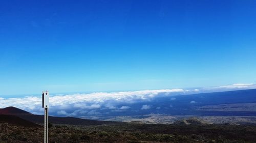 Scenic view of mountains against clear blue sky