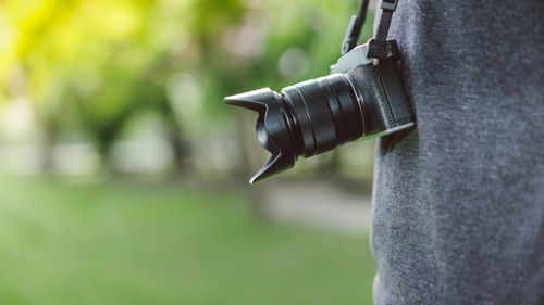 Close-up of camera photographing outdoors