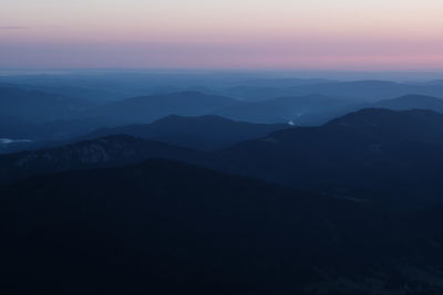 Scenic view of mountains against sky during sunset