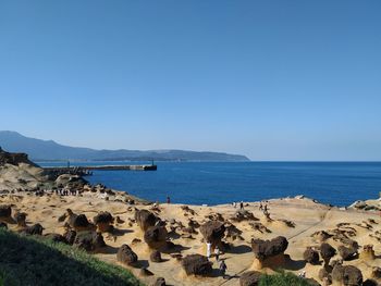 Scenic view of sea against clear sky