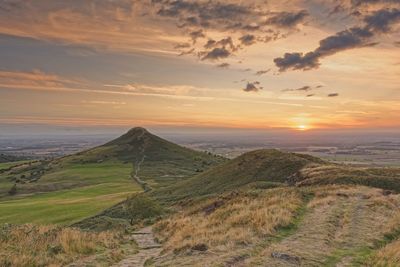 Scenic view of landscape against sky during sunset