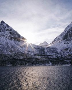 Scenic view of mountains against sky during winter