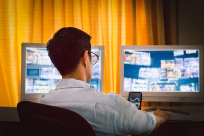 Businessman working on stock money charts and graph on computer screen