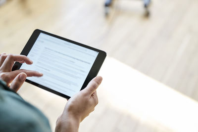 Tablet in woman's hands