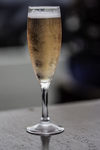 Close-up of beer glass on table