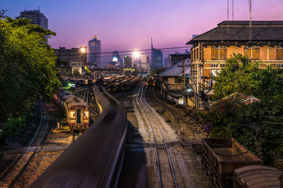 Blurred motion of train during dusk at bangkok railway station