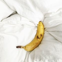 High angle view of yellow fruit on bed