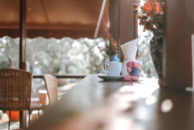 Coffee cup on table at cafe