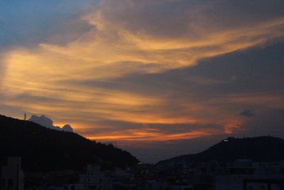 Scenic view of dramatic sky during sunset