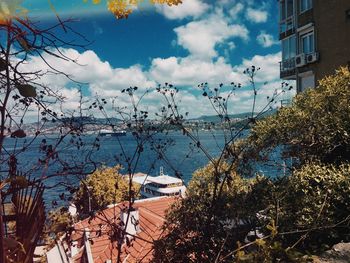 Panoramic shot of buildings and sea against sky