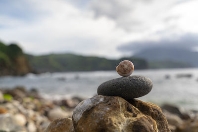 Close-up of stone stack on rock