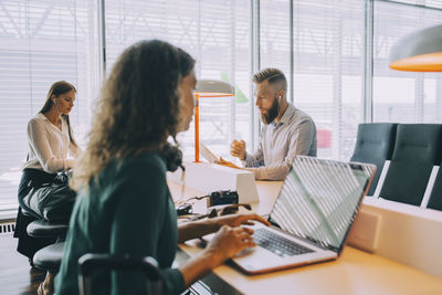 Group of people working on table