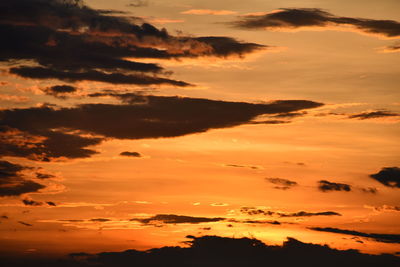 Scenic view of dramatic sky during sunset