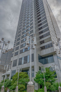 Low angle view of modern buildings against sky