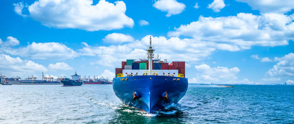 Ship in sea against sky