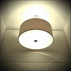 Low angle view of illuminated lamp