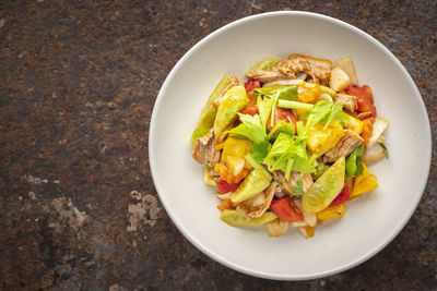 High angle view of salad in plate on table