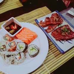 High angle view of sushi served on table