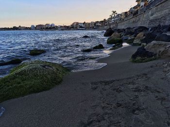 Scenic view of sea against sky during sunset